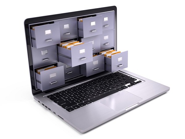 Immagine di un computer con dei cassetti 